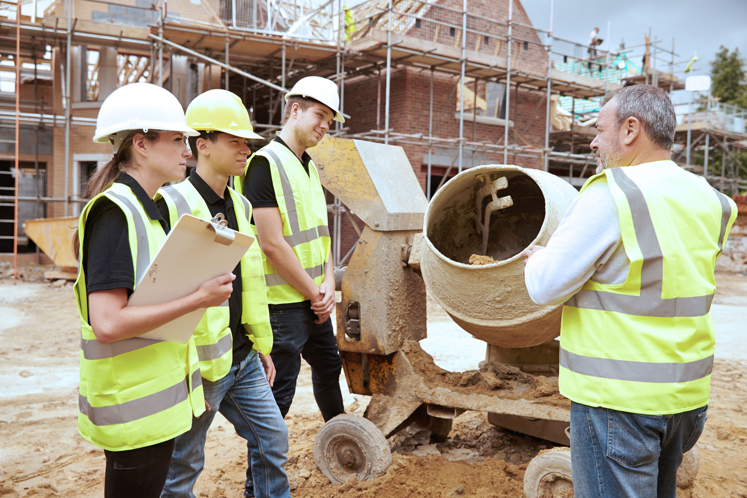 A group of students in person training on construction site